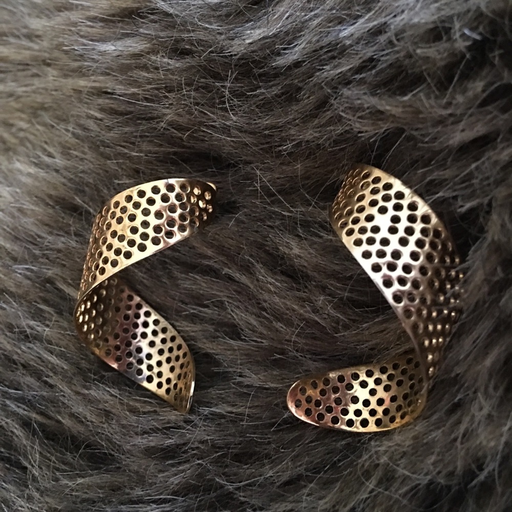 Gold tone twisted mesh pierced earrings